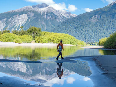 Fly Fishing Photography Portfolio Patagonia lake mountains wading reflection