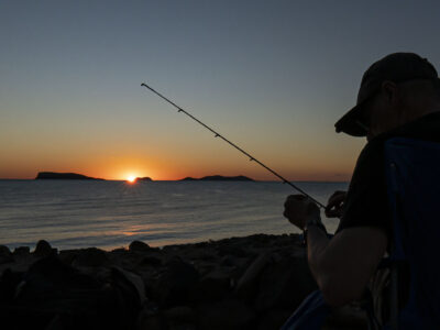 DIY Fishing Adventure Travel Photography Tips Techniques Baja Mexico sunrise fishing prep silhouette